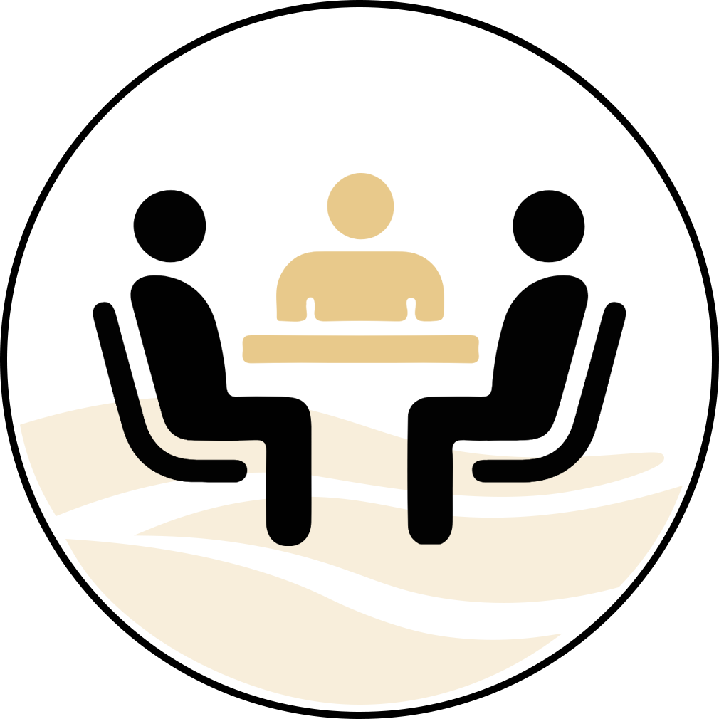 Two people are sitting at a table having a conversation.