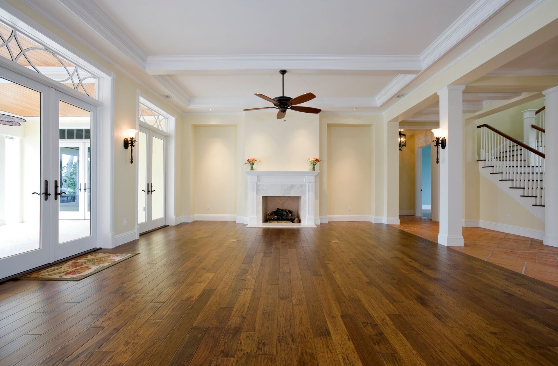 Stunning hardwood floor resurfacing in a living room.
