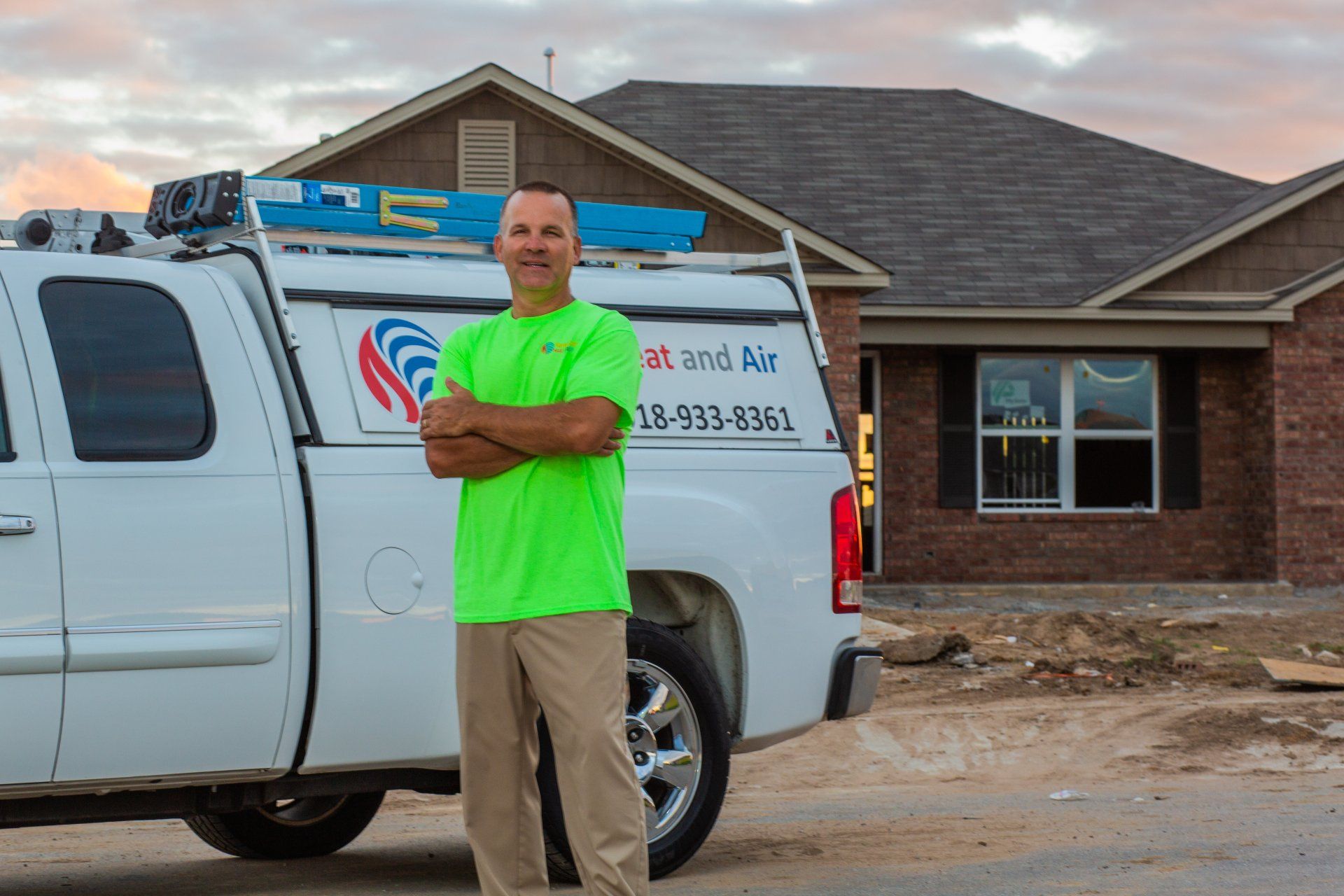 man standing by truck
