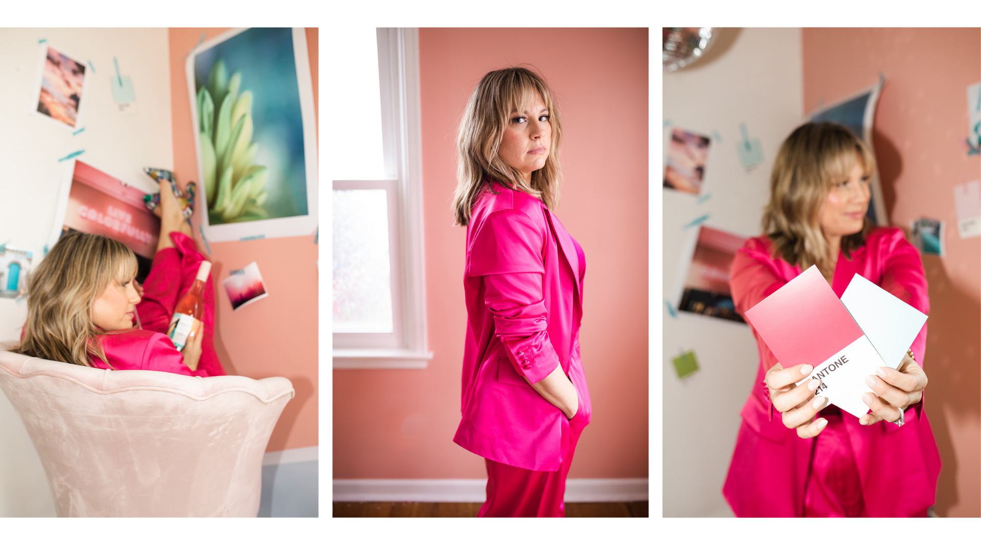 A woman in a pink suit is standing in front of a pink wall.