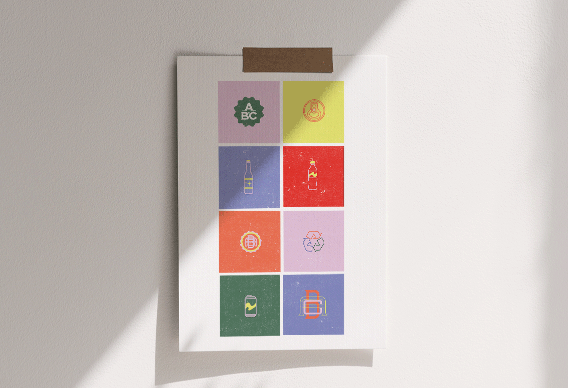 A colorful poster is hanging on a white wall.