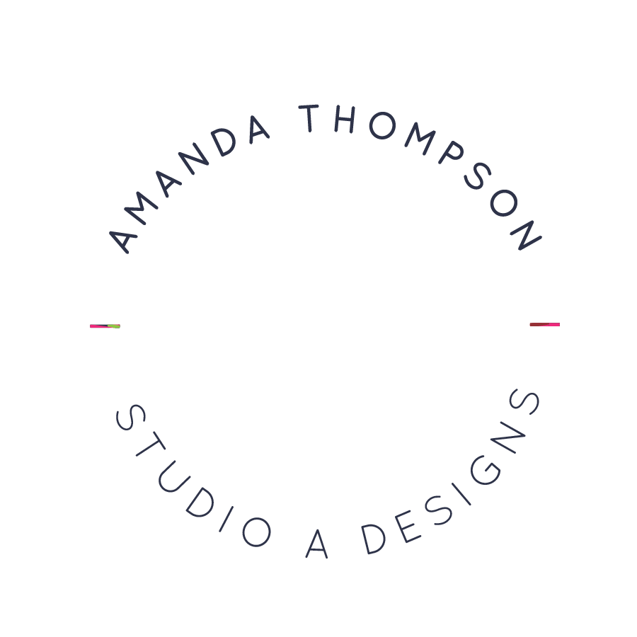 A logo for amanda thompson studio a designs