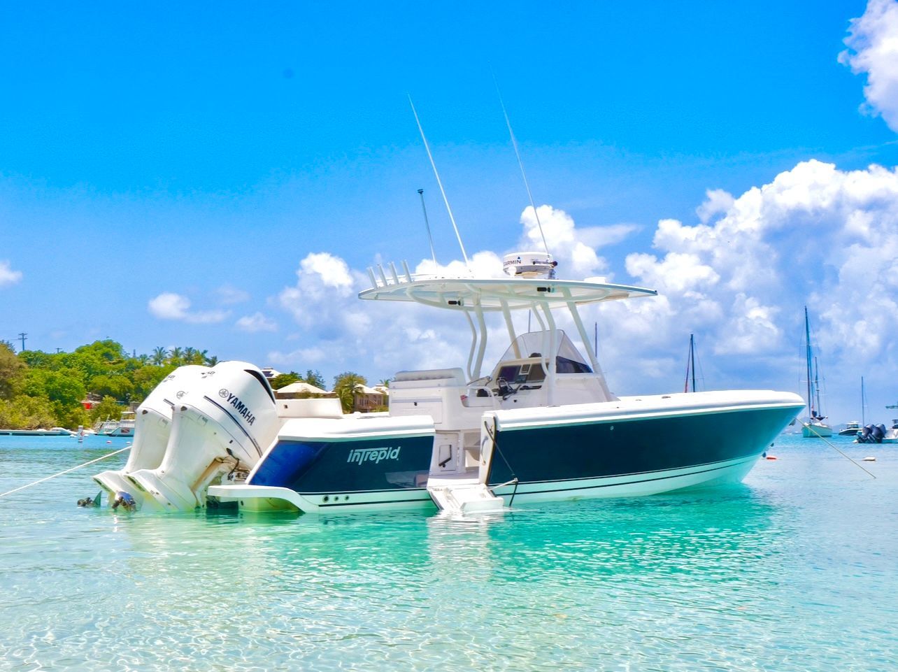 A boat with a mercury outboard motor is in the water