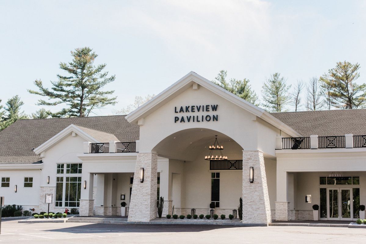 A large white building with a sign that says lakeview pavilion.