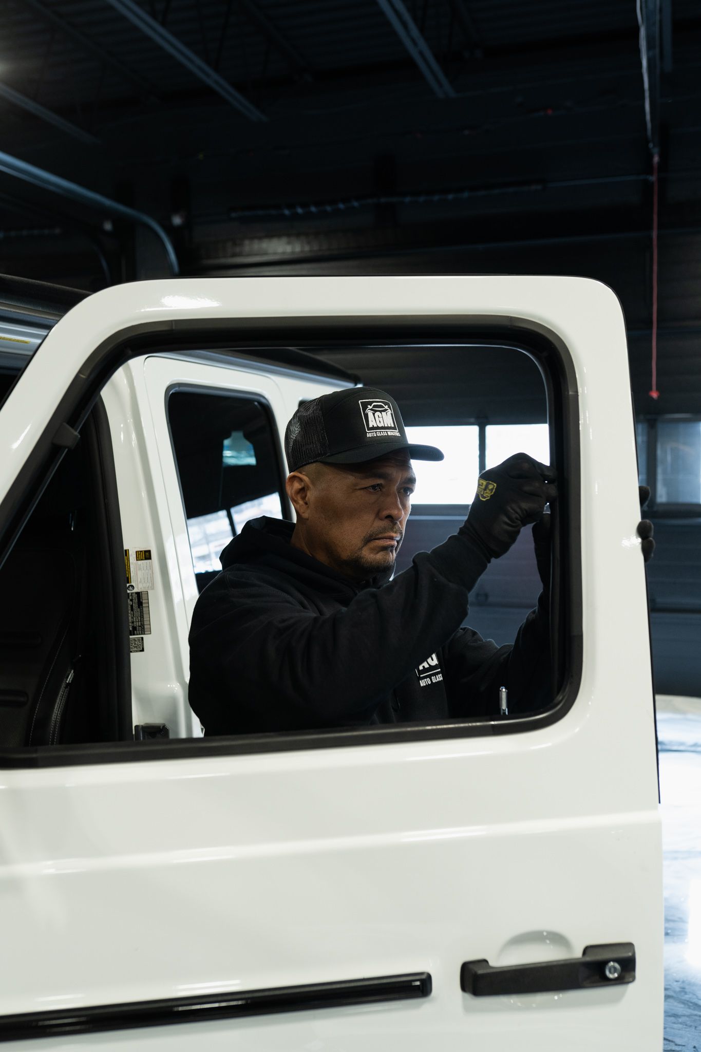 A close up of a car door handle on a black car