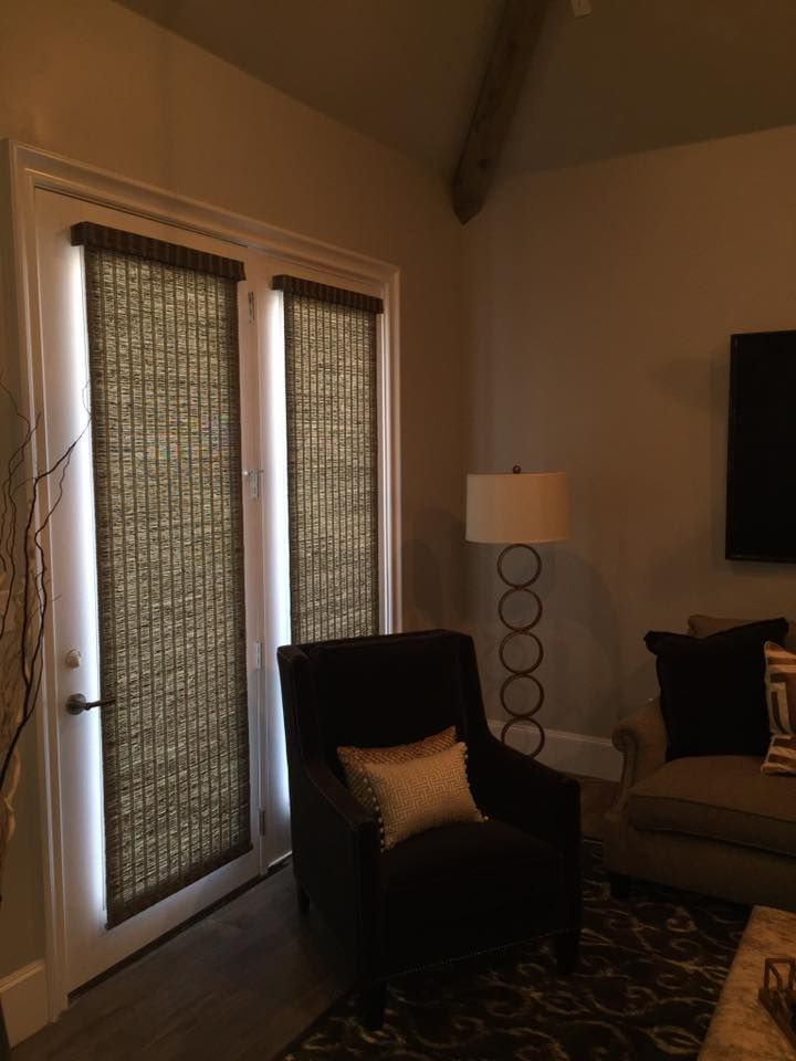 A Living Room With A Chair And A Lamp – Lubbock, TX – Wilson Blind & Shutter