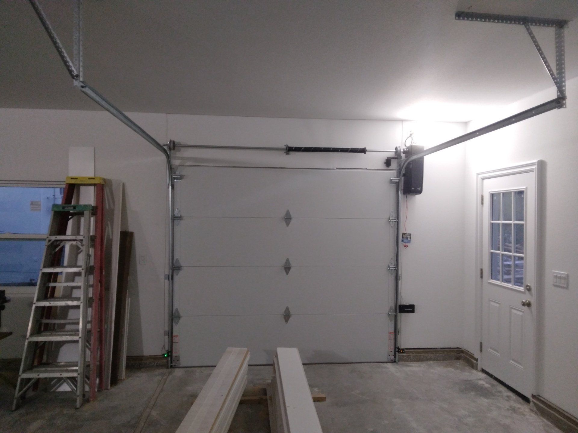 The inside of a garage spring service in the Greater Bay area by Garage Door Excellence