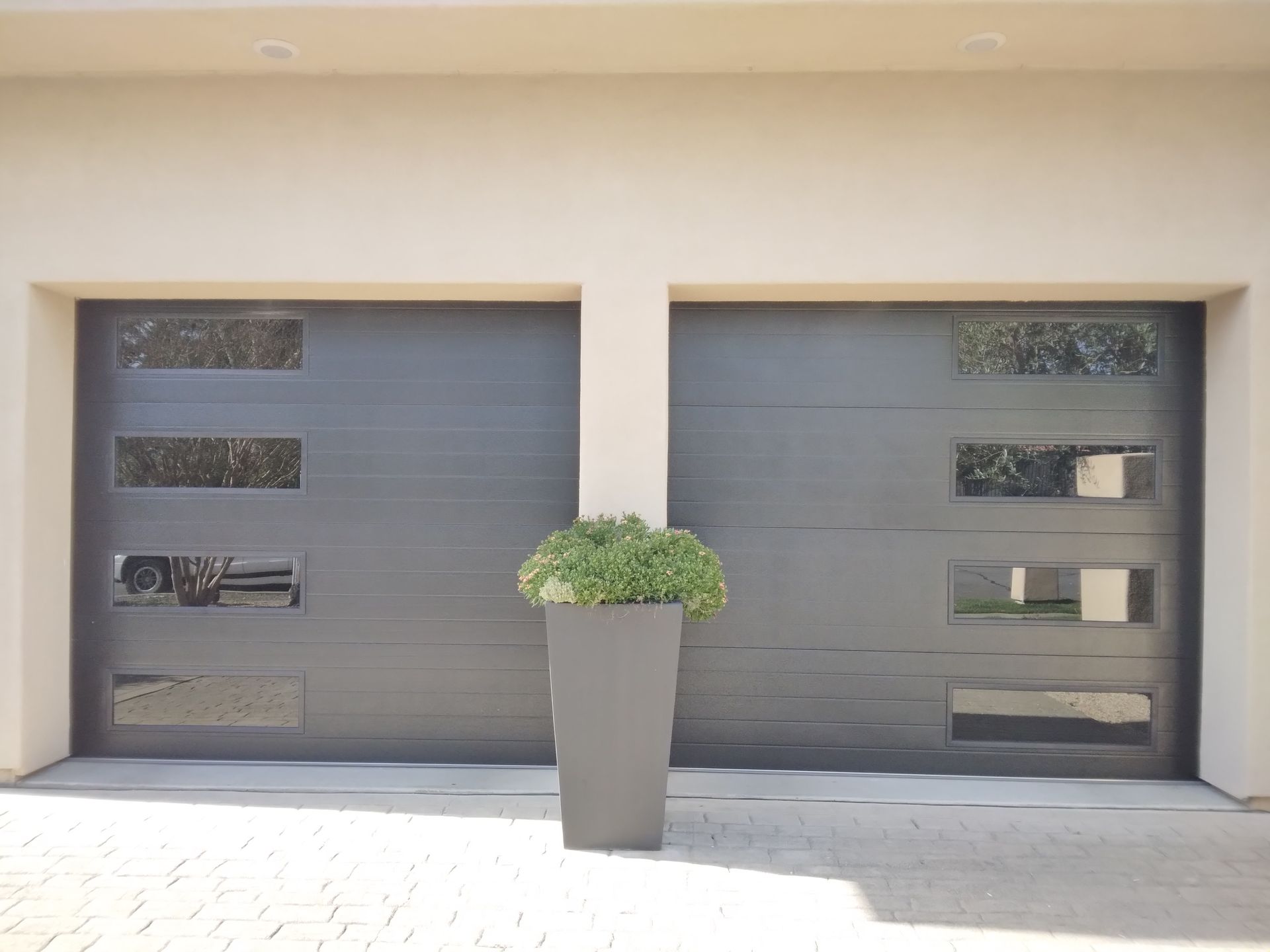 The outside view of a double door garage door installation in Fairfield, CA by Garage Door Excellence