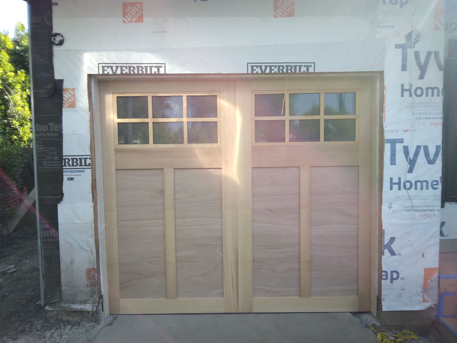 The outside of a residential garage door installation in the Greater Bay area provided by Garage Door Excellence