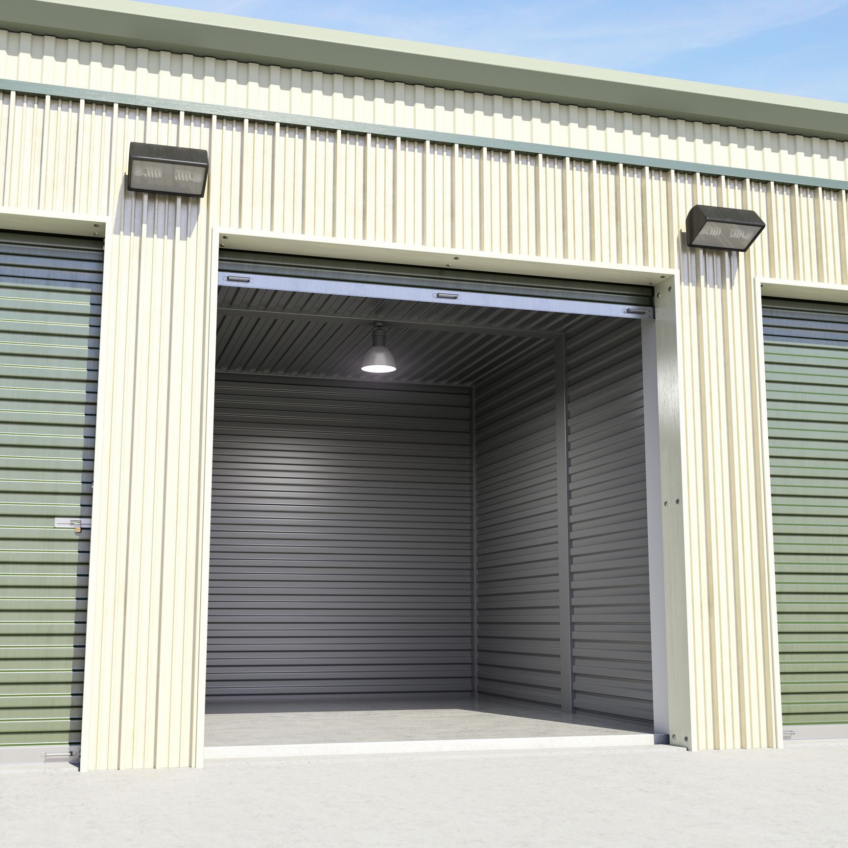 Open storage unit with green doors, lit inside.
