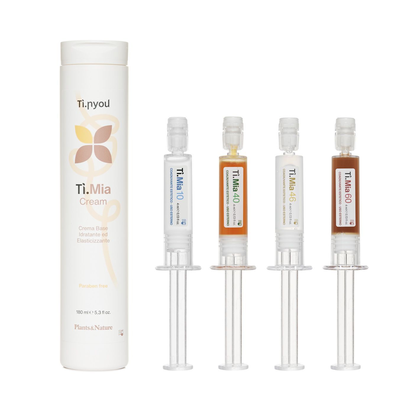 Una bottiglia di crema tlmia accanto a quattro siringhe