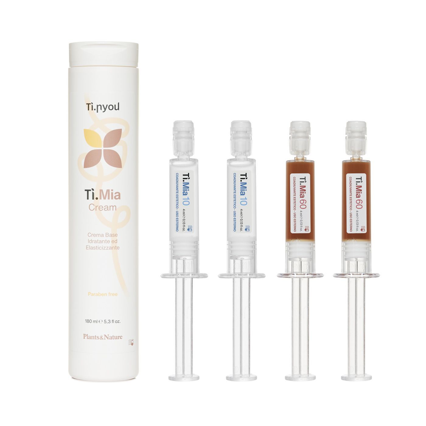 Tre siringhe accanto a una bottiglia di crema tlmia