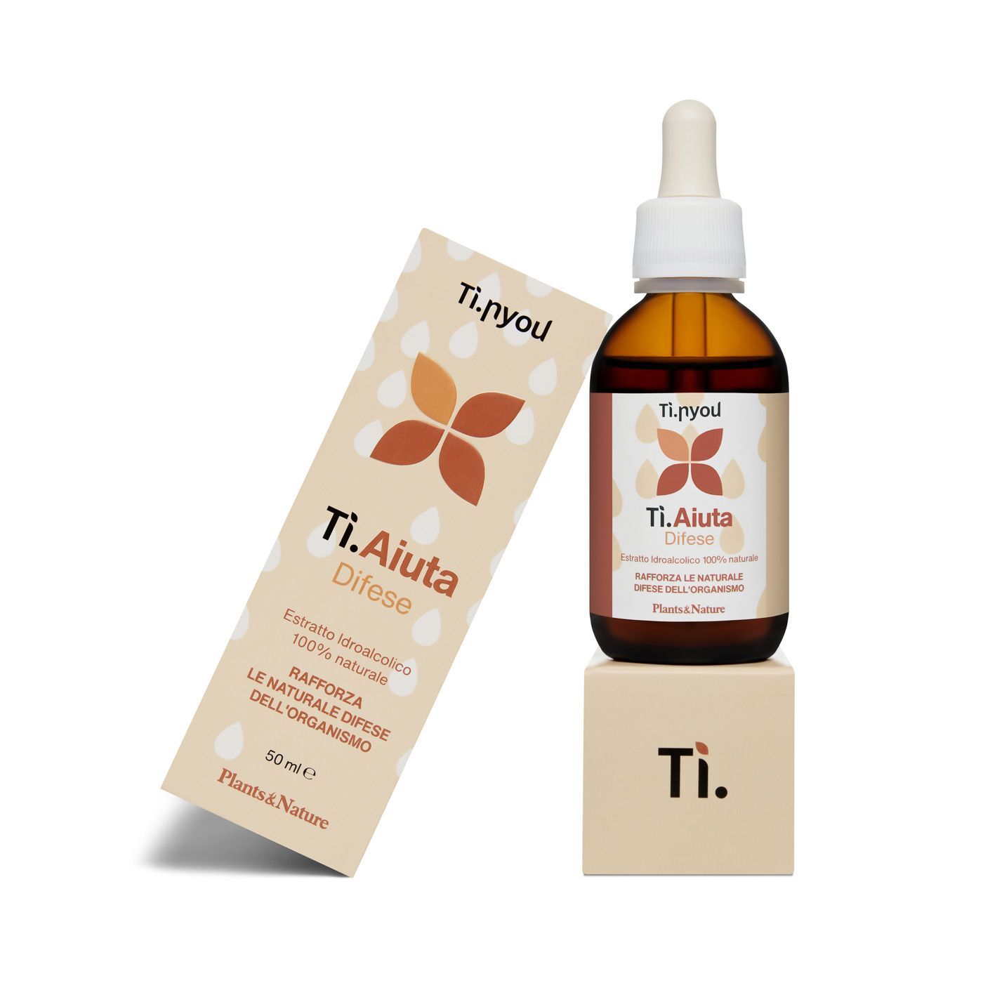 Accanto alla scatola c'è una bottiglia di ti.aiuta