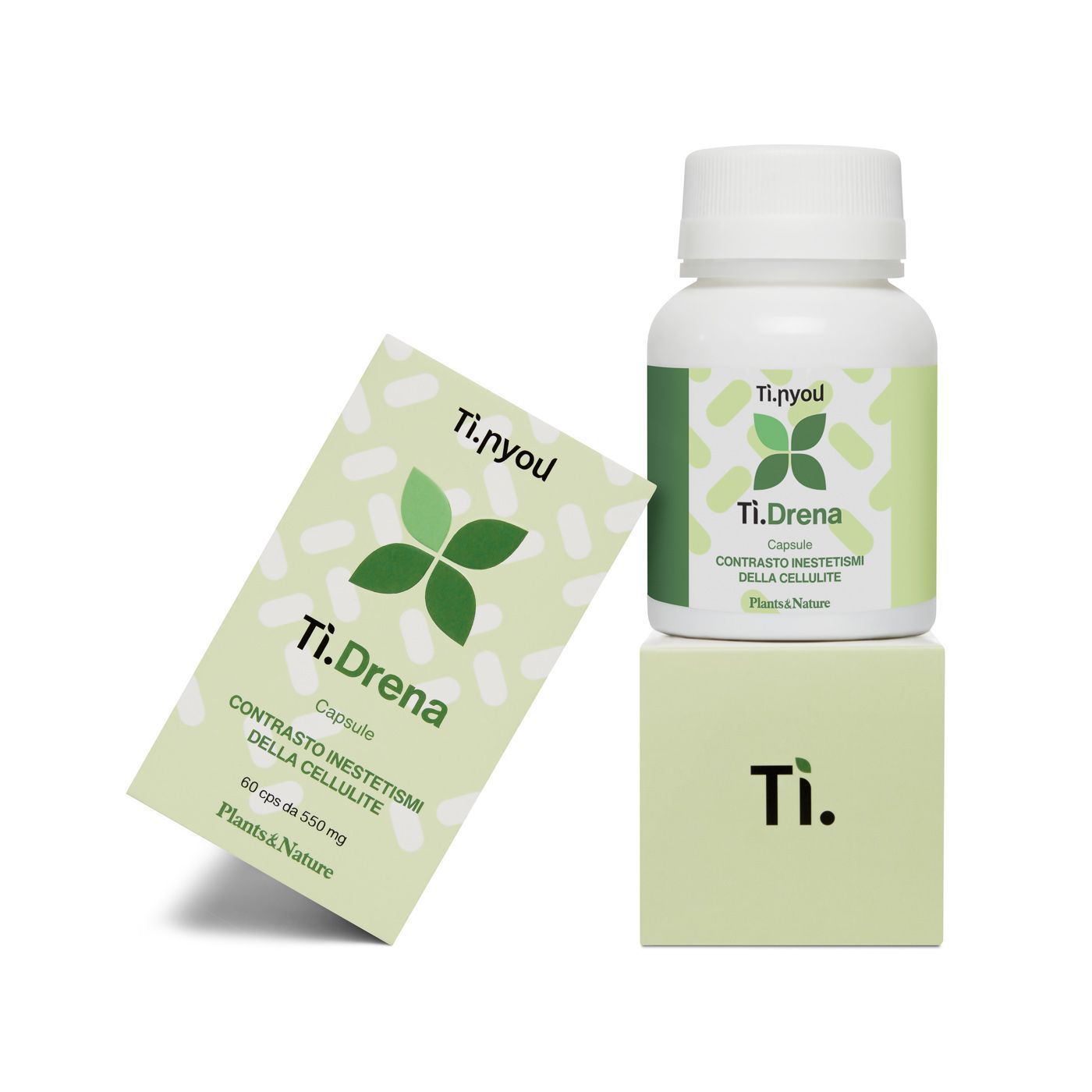 Una bottiglia di ti drena è posata sopra una scatola