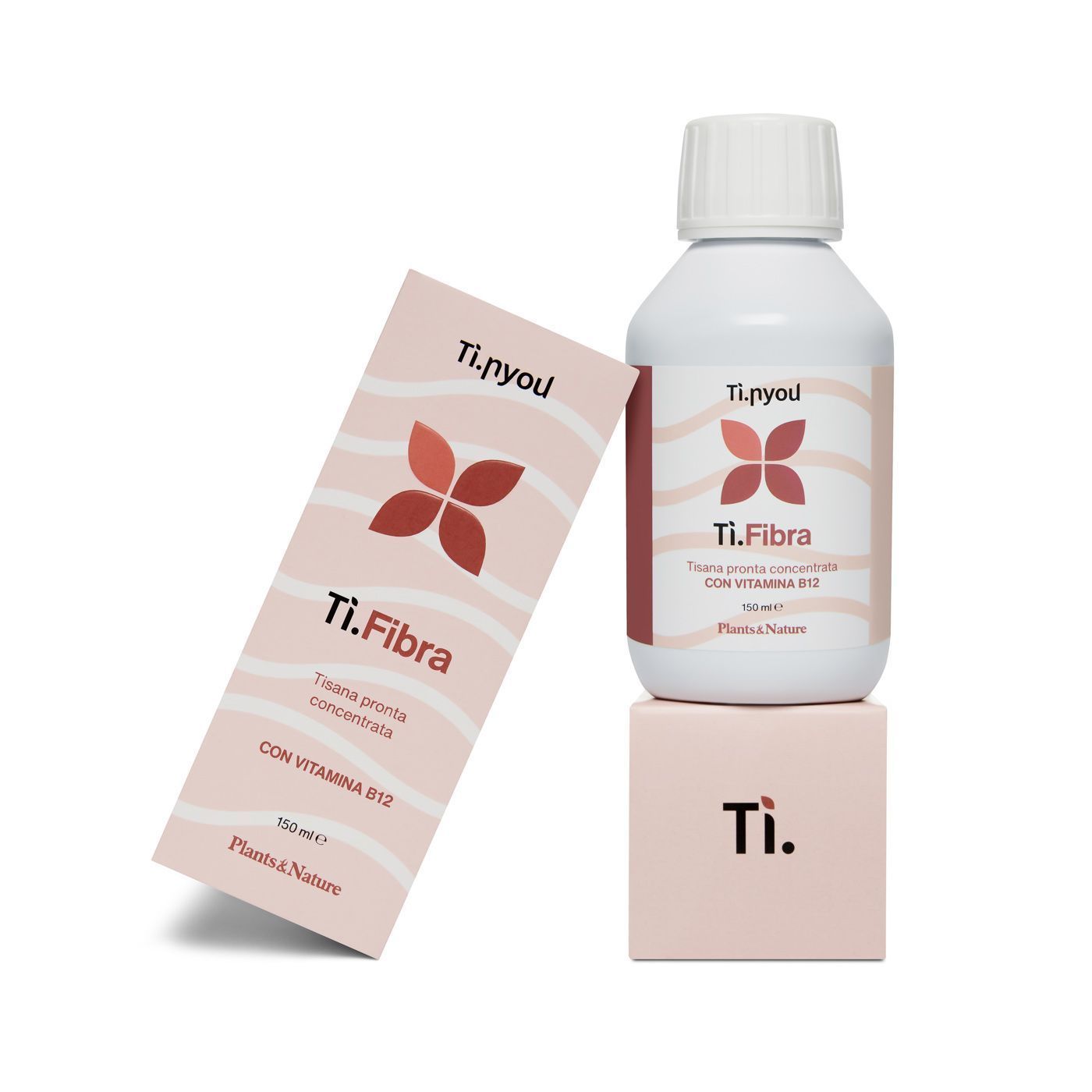 Una bottiglia di ti fibra è posata sopra una scatola.