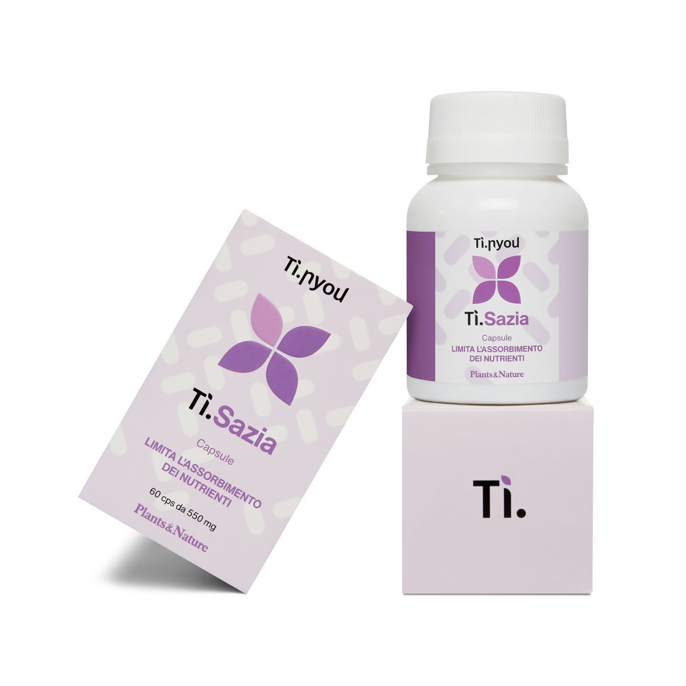 Sopra una scatola c'è una bottiglia di ti sazia.