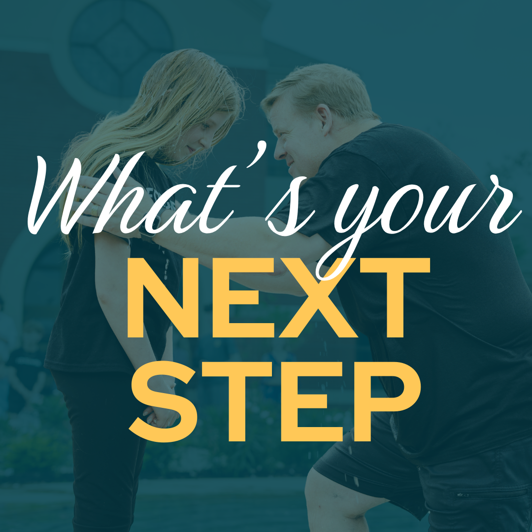 Man leaning toward girl with text 