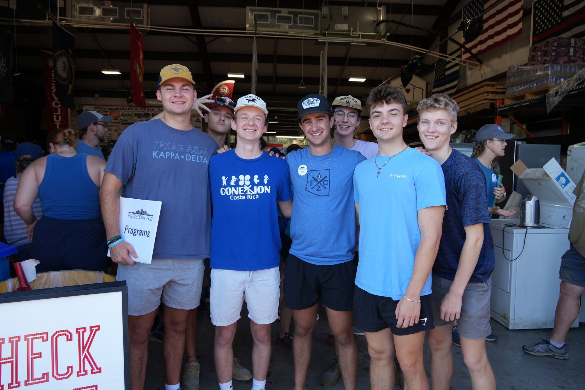 A group of young men are posing for a picture