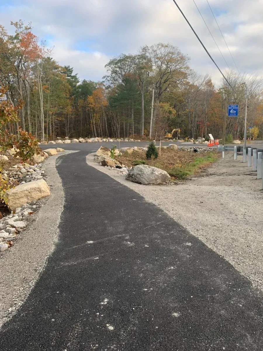 A road with trees on the side of it