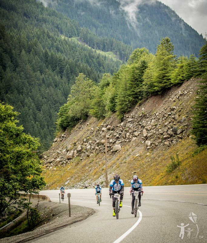 Bike riders going through the mountains.