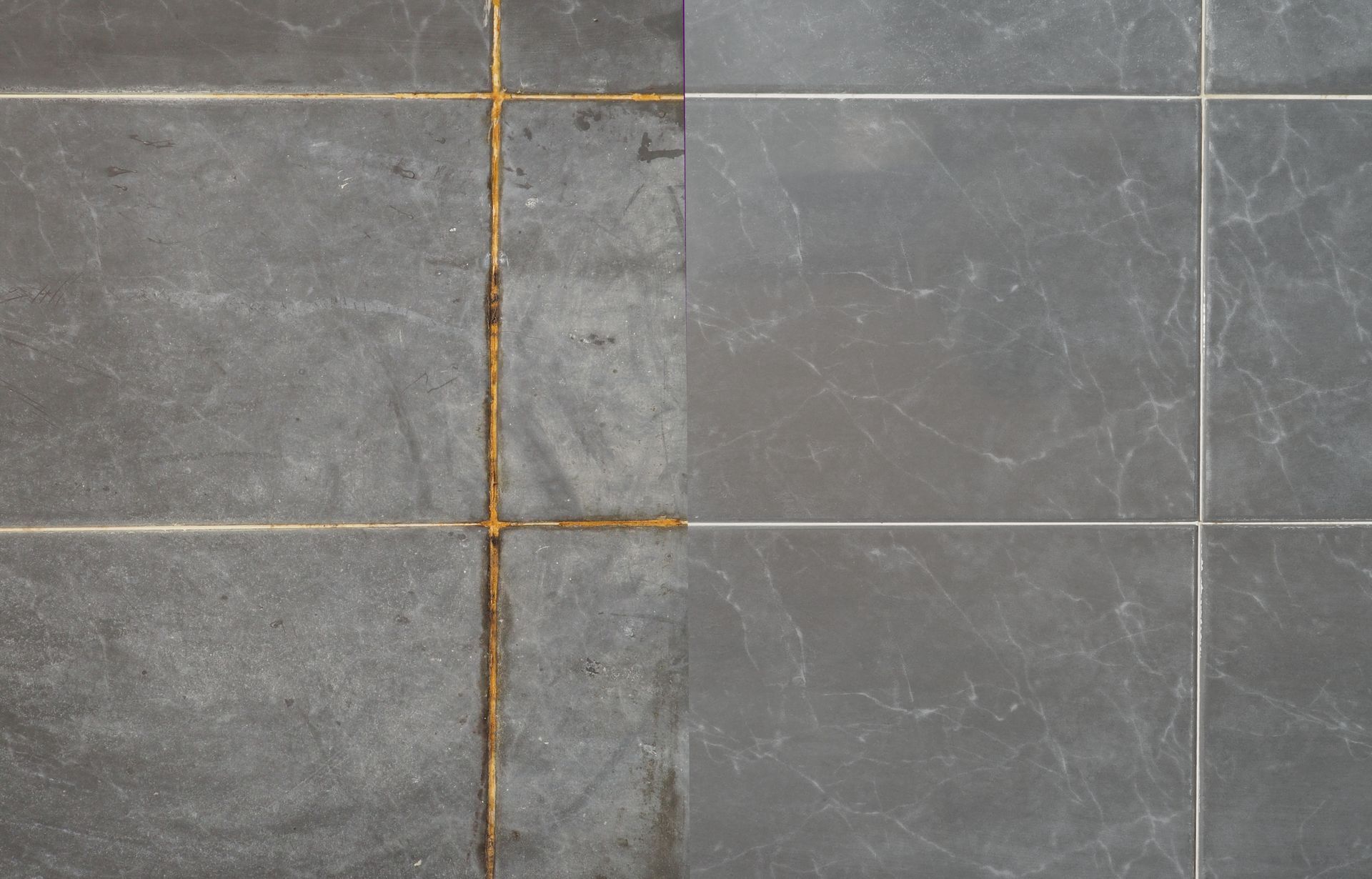 Tile floor, before and after cleaning. The grout is clean on the right half, and dirty and stained on the left.