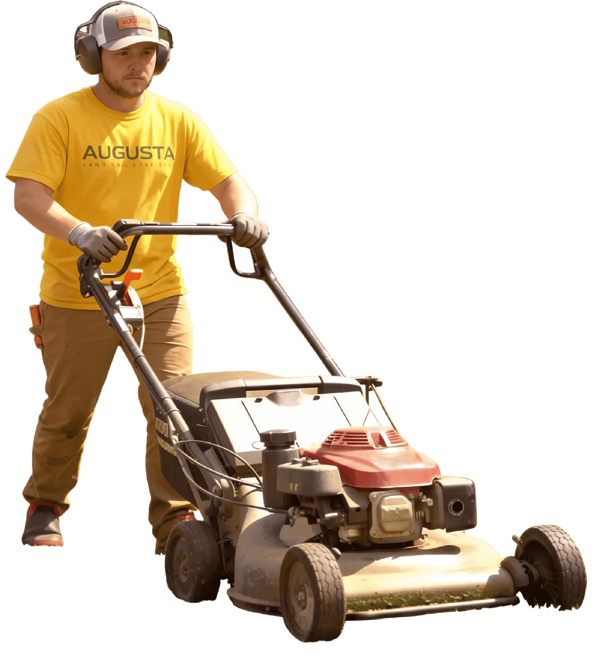 A person mowing grass with a lawnmower, wearing ear protection and gloves.