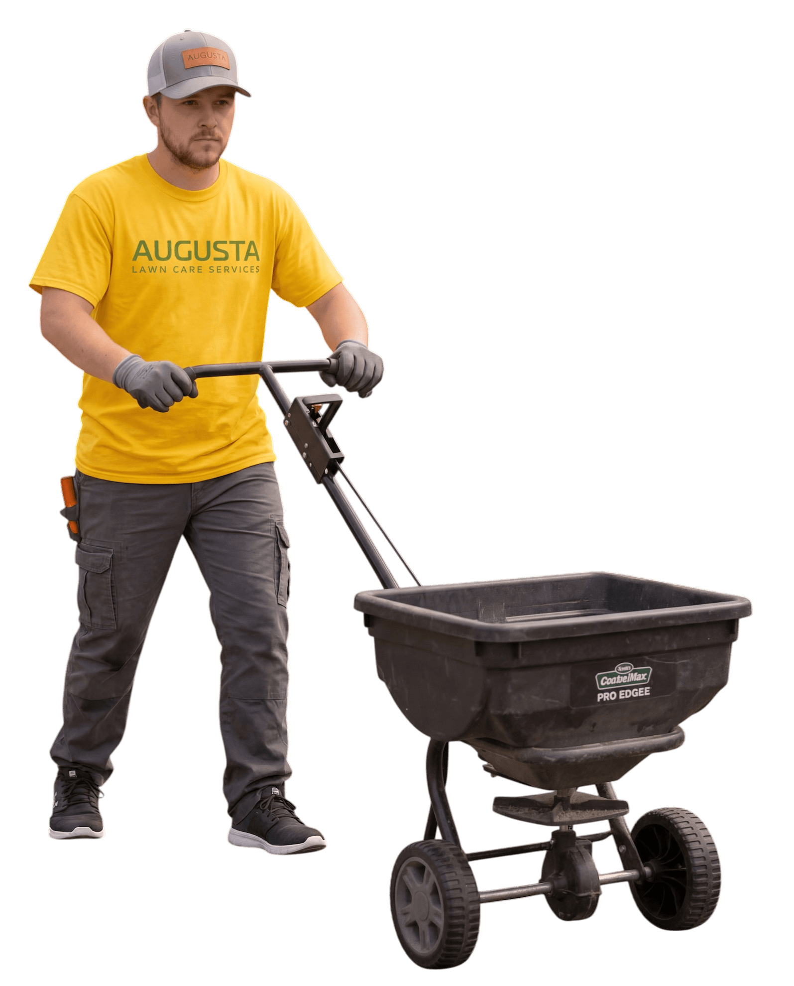 A person mowing grass with a lawnmower, wearing ear protection and gloves.