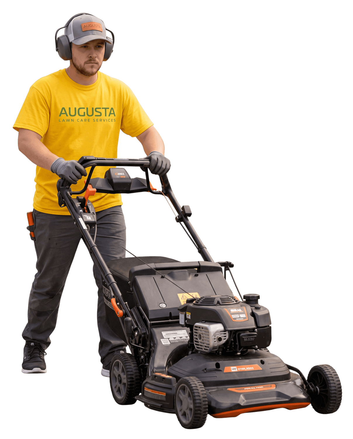 A person mowing grass with a lawnmower, wearing ear protection and gloves.