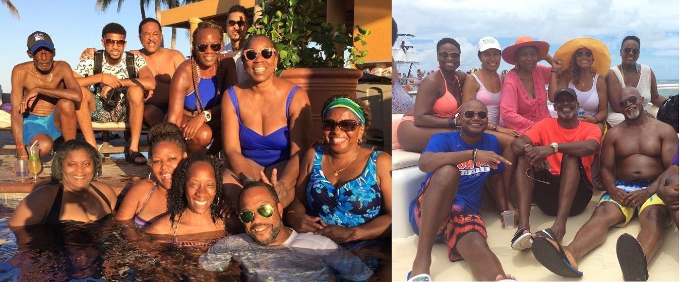 A group of people are posing for a picture in a pool and on a boat.