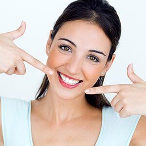 Woman with perfect smile — Family Dentistry in Castleton, NY