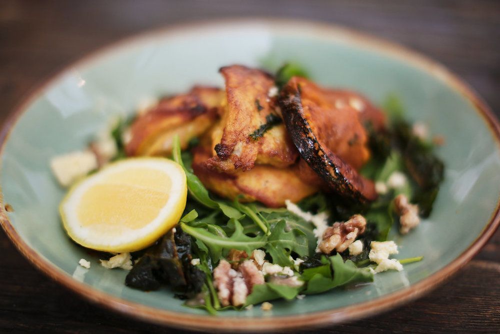 A close up of a plate of food on a table.
