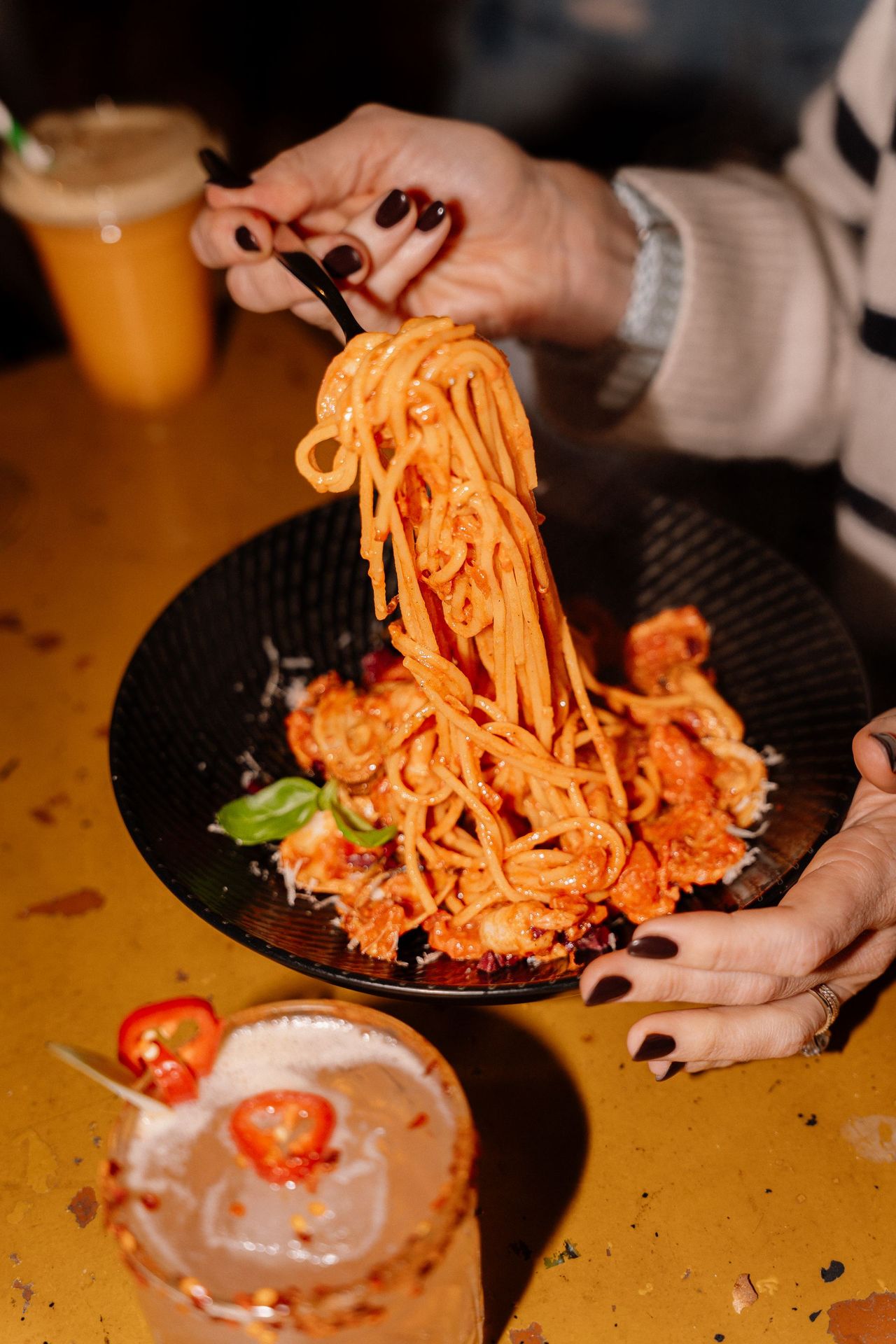 Spaghetti with a cocktail
