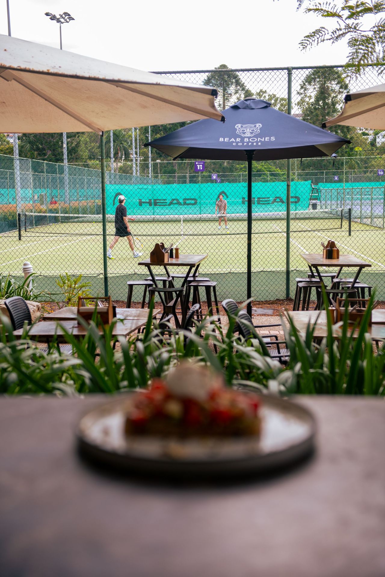 Terrace overlooking the tennis courts