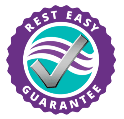 A rest easy guarantee logo with a check mark