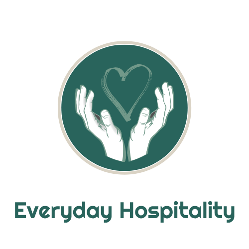 Logo with hands holding a heart inside a teal circle, labeled “Everyday Hospitality”