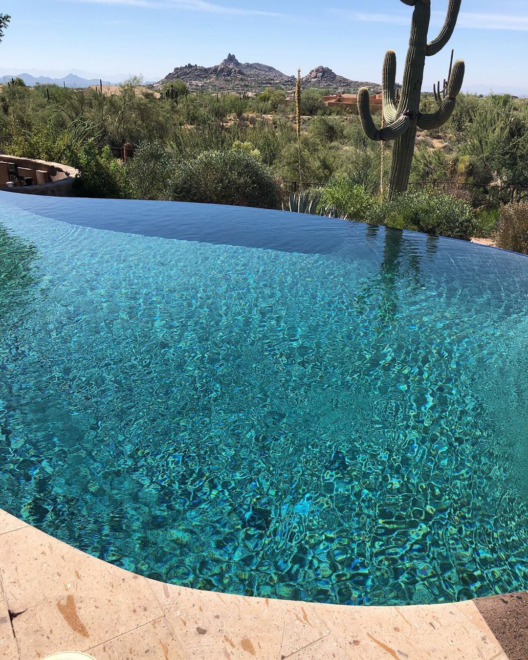 infinity pool with cactus fountain hills