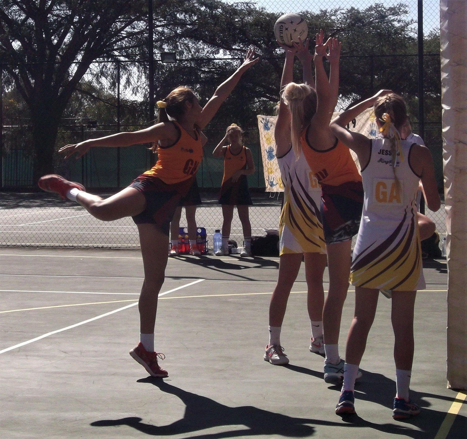 A girl wearing a jersey with the number ga on it