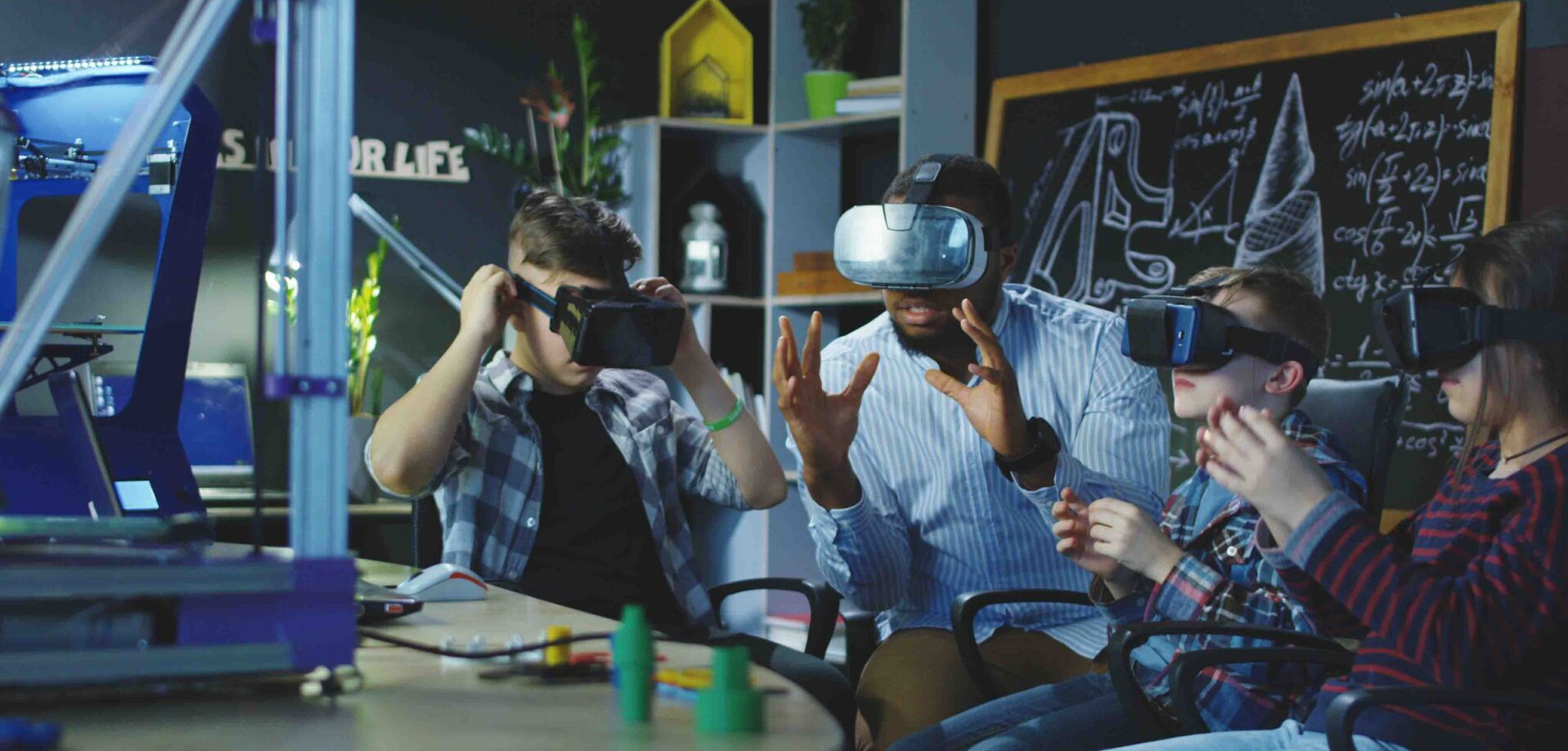 A group of people are wearing virtual reality headsets in a room.