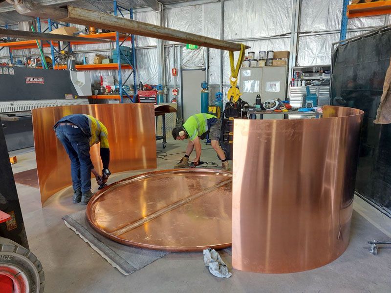Copper vat being constructed
