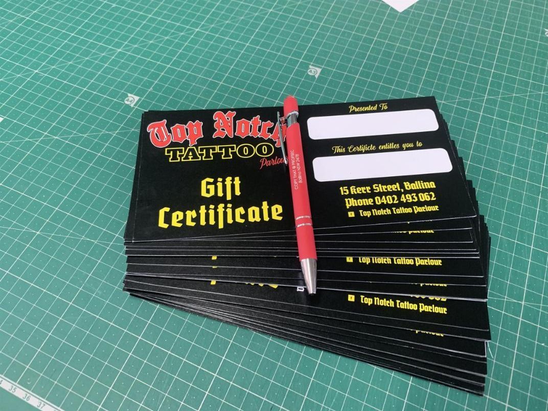 Stack of Gift Certificates With a Pen on Top of Them — Copy That @ Profsec in Ballina, NSW