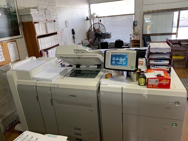 Large Printer is Sitting on Top of a Counter in a Room — Copy That @ Profsec in Ballina, NSW