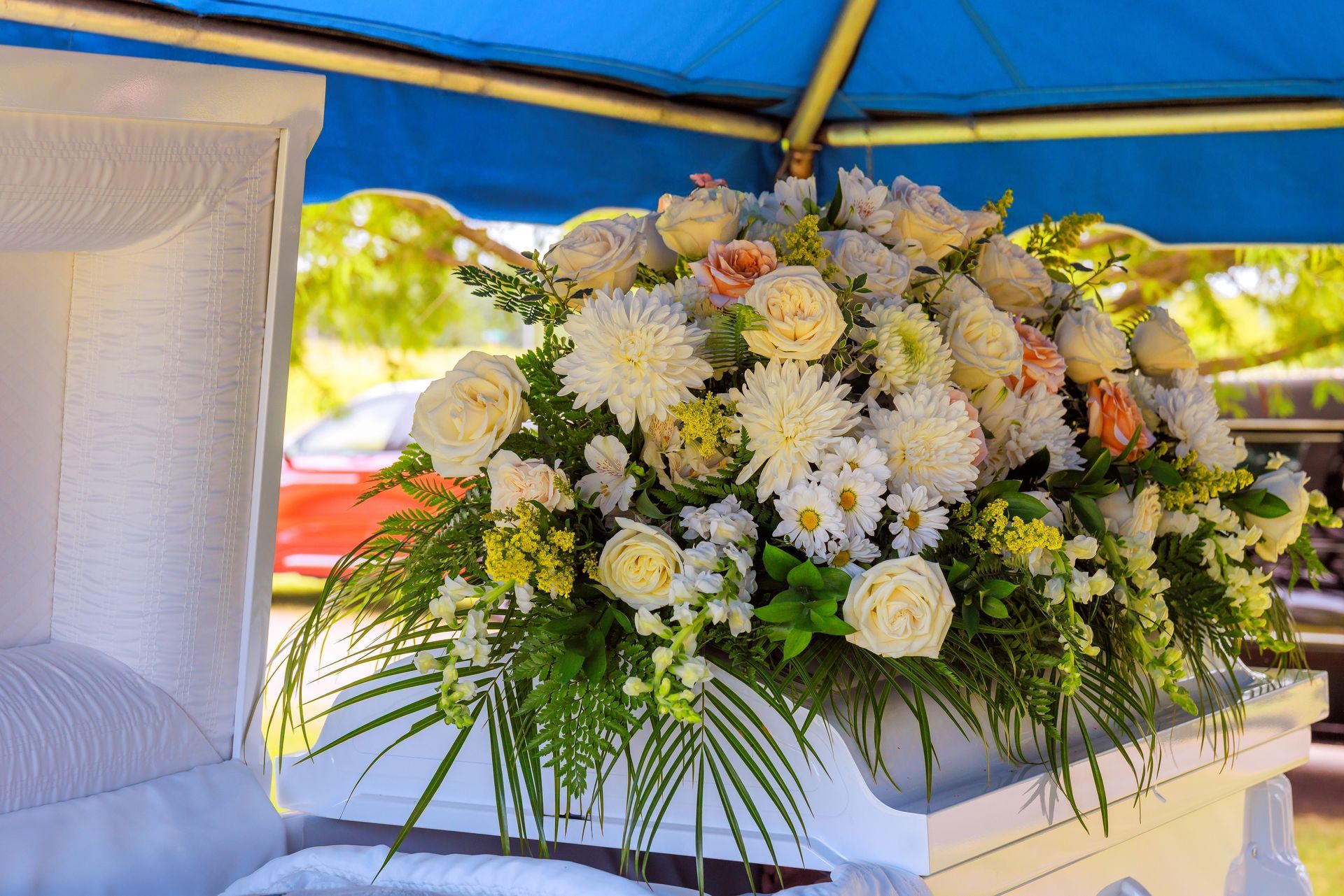 A man is standing in front of an open bible in a church.