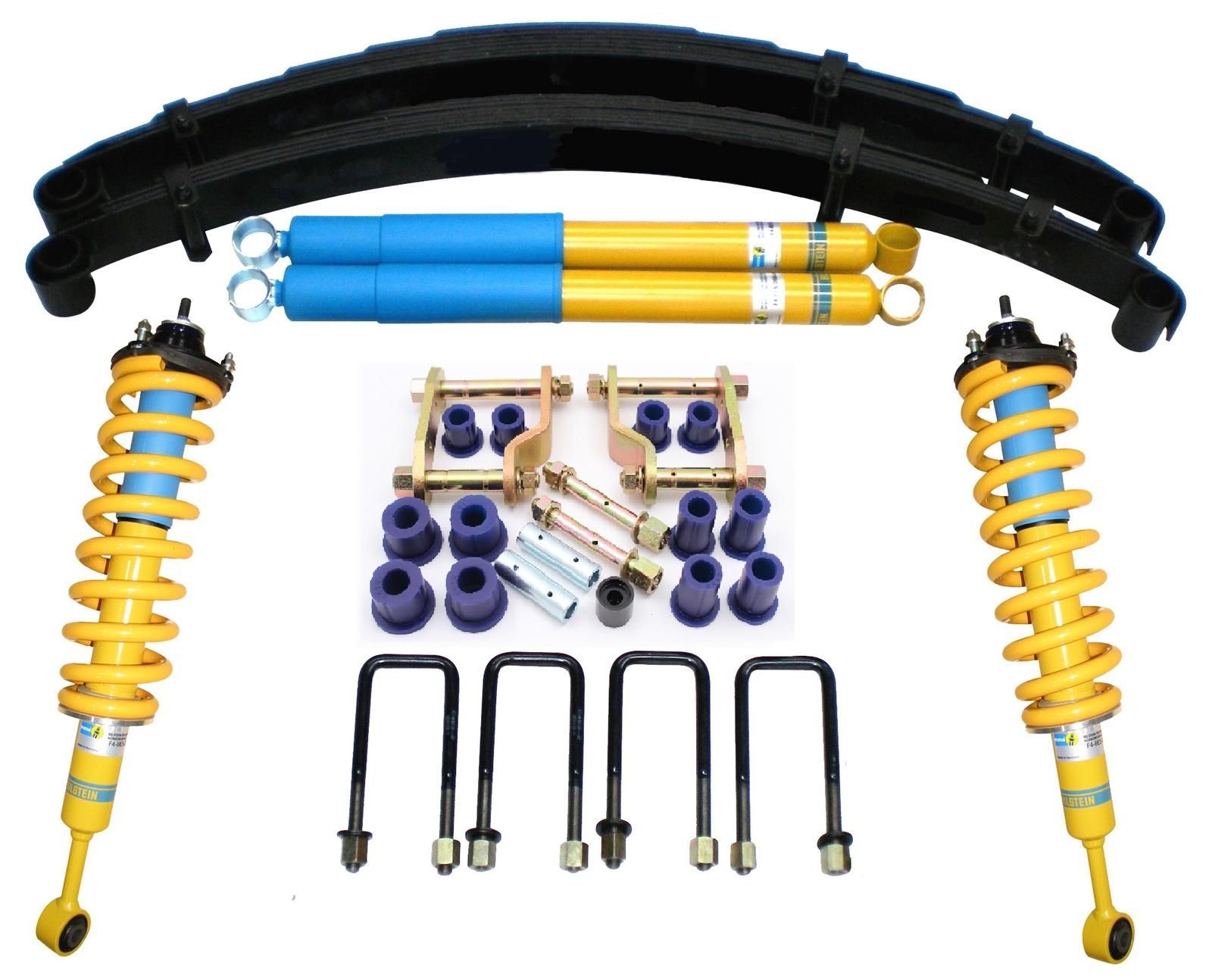 Automotive suspension lift kit featuring leaf springs, two front coilovers, two rear shocks, U-bolts, and mounting hardware.
