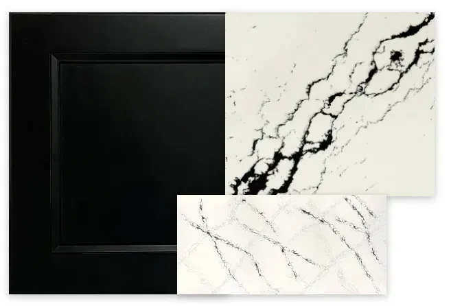 Black cabinet door next to white countertops with black veining.
