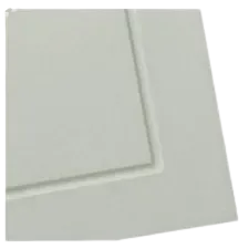 White corner of a smooth, possibly laminated, surface with a recessed border.