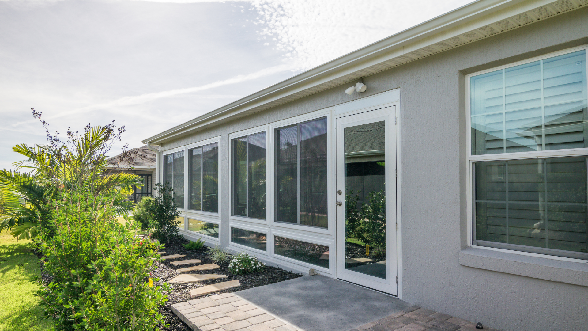 A house with a lot of windows and doors