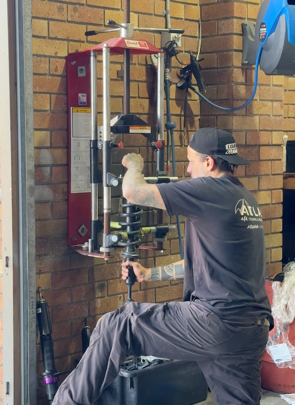 Person operating a suspension tool 