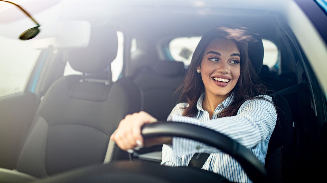 Woman Driving a Car — Corpus Christi, TX — Randy Russell Insurance