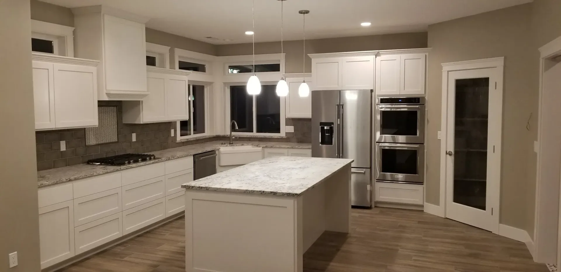 An aerial view of a house with a copper roof.