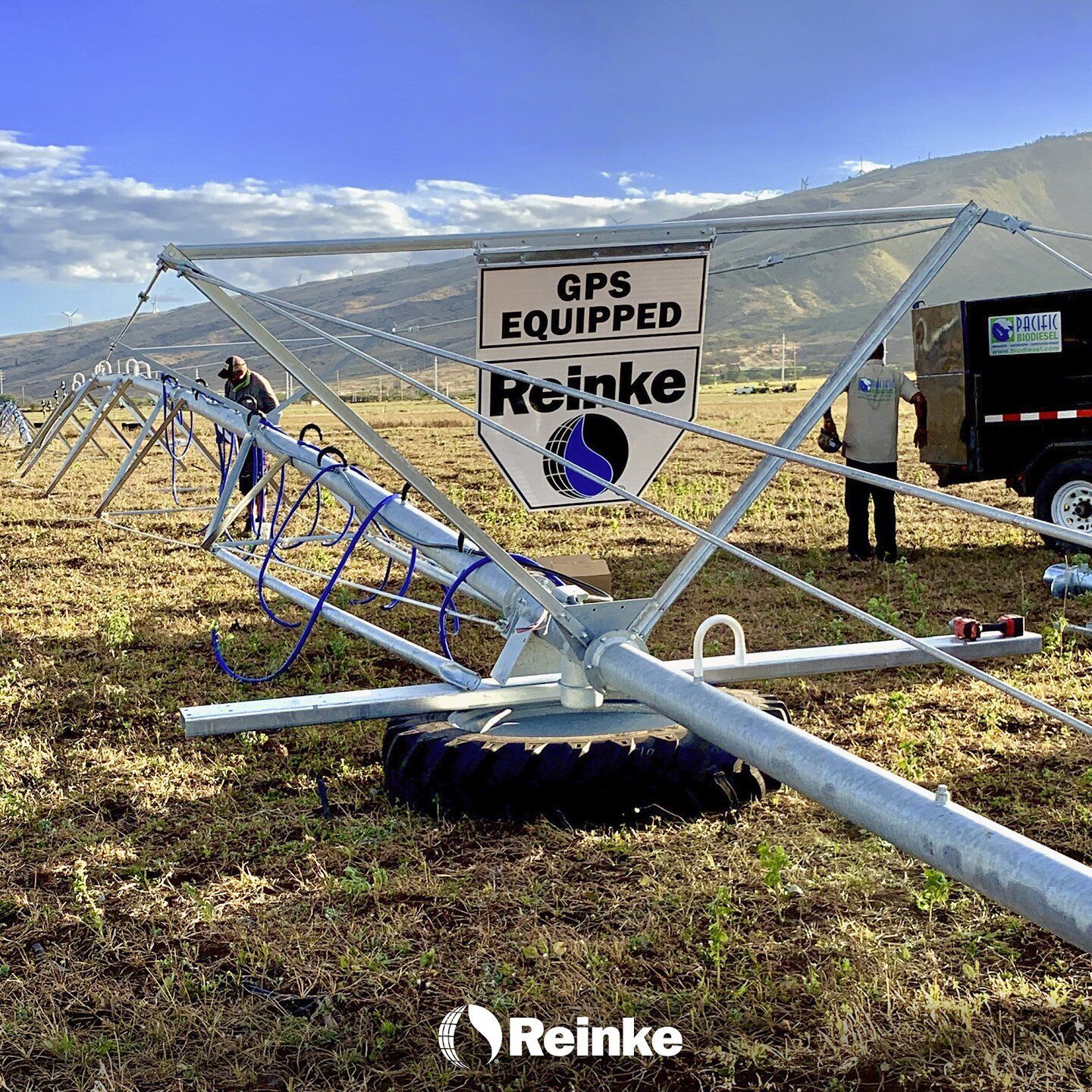 A bunch of pipes are connected to each other in the dirt.